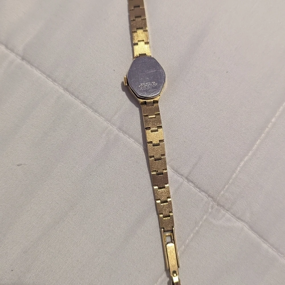 Oris Gold Timepiece with Ivory Dial